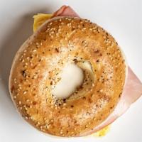 Bagel Sandwich · Bagel, eggs, ham, and cheese. Calories 638, protein 54, fat 27, carbs 56.