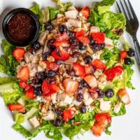 Mixed Berry Salad · Romain lettuce, strawberry, blueberry, cranberry, walnuts, chicken, blue cheese and strawber...