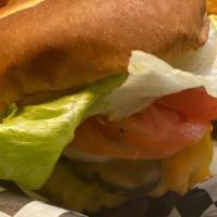 Beef Burger · All beef burger grilled , served on a bun with lettuce, tomato, pickles, onions and mayo. Co...