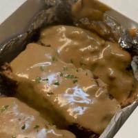 Meatloaf · 3 to 4 Slices of all-beef meatloaf, smothered in gravy.