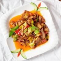 Twice Cooked Pork · Pork slices stir fried with bell pepper and scallion, mid spicy dish. Please notate the orde...