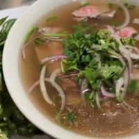 Beef Pho · Choice of two meats, rice noodles, cilantro, basil, bean sprouts, and sliced onions served i...