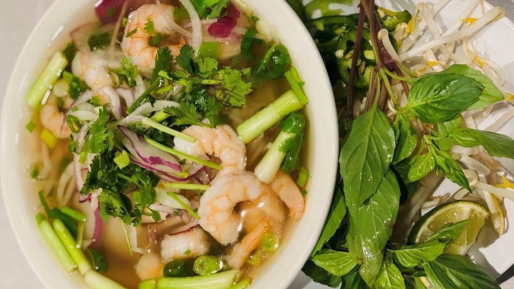 Shrimp Pho · Shrimp, rice noodles, cilantro, basil, bean sprouts and sliced onions served in a savory beef broth.