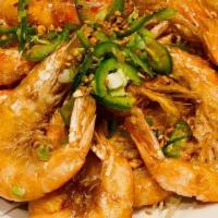 Crispy Shrimp With Salt And Pepper · Fried shrimp tossed with garlic chips.