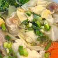 Wor Wonton Soup · Wontons stuffed with minced pork and shrimp served in a rich broth with vegetables and slice...