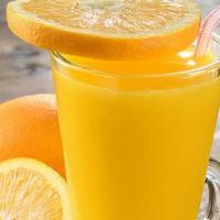 Fresh Orange Juice · Fresh squeezed orange juice poured over ice.