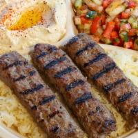 Kofta(Ground Beef) Plate · Two premium ground beef kebabs. Served with hummus, Israeli salad, rice, and two pieces of p...