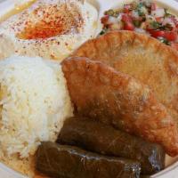Spinach Pie Plate · (2pc) spinach pie and two stuffed grape leaves. Served with hummus, Israeli salad, rice, and...