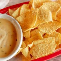 Chips & Queso · Gluten-Free. Queso cheese with tortilla chips.