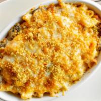 Gt Sig Mac N Cheese · Our house-made mac-n-cheese with caramelized onions, roasted red peppers, sautéed mushrooms ...