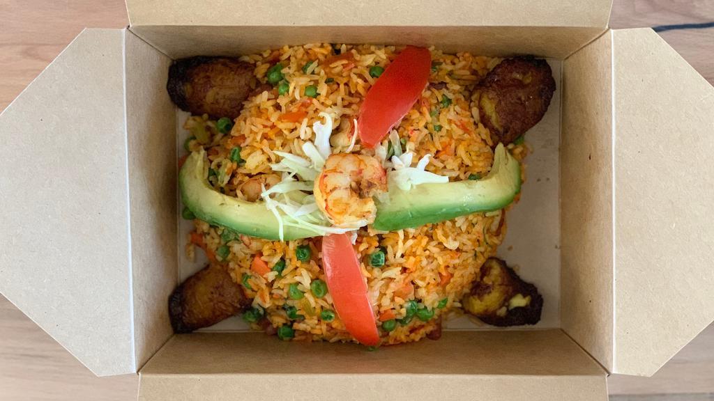 Arroz Colombiano · A blend of shrimp, sausage, and rice cooked in RE's tomato blend and achiote, celery, onions, red bell peppers, carrots, cilantro, garnished with maduros.