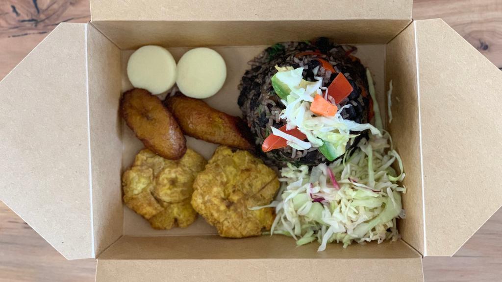 Gallo Pinto · Black beans and rice with sliced avocado, tomatoes, heart of palm, cabbage salad, maduros, and tostones.