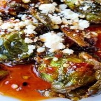 Brussels Sprouts · Brussels sprouts - sweet and spicy sesame - goat cheese.