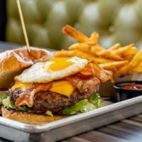 All American Burger · American cheese- applewood bacon- fried egg-lettuce-tomato-onion.