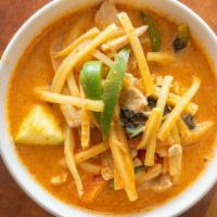 Red Curry · Spicy. Coconut milk, bamboo shoots, zucchini, bell peppers, basil.