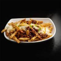 Chili Cheese Fries · Fries topped with beef chili, cheese sauce, and shredded cheddar