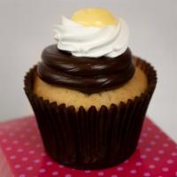 Boston Cream Pie · Vanilla cupcake filled with bavarian creme and topped with fudge icing.