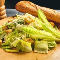 Caesar Salad · Chopped Romaine, Shredded Parmesan Cheese, Roasted Garlic & Herb Croutons, Creamy Caesar Dre...