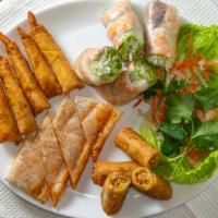 Appetizer Sampler · Includes an order of egg rolls, spring rolls, tempura shrimp and crispy shrimp and pork paste.