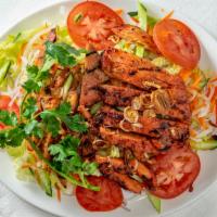 Oriental Salad · A choose between grilled pork, chicken or fried tofu.