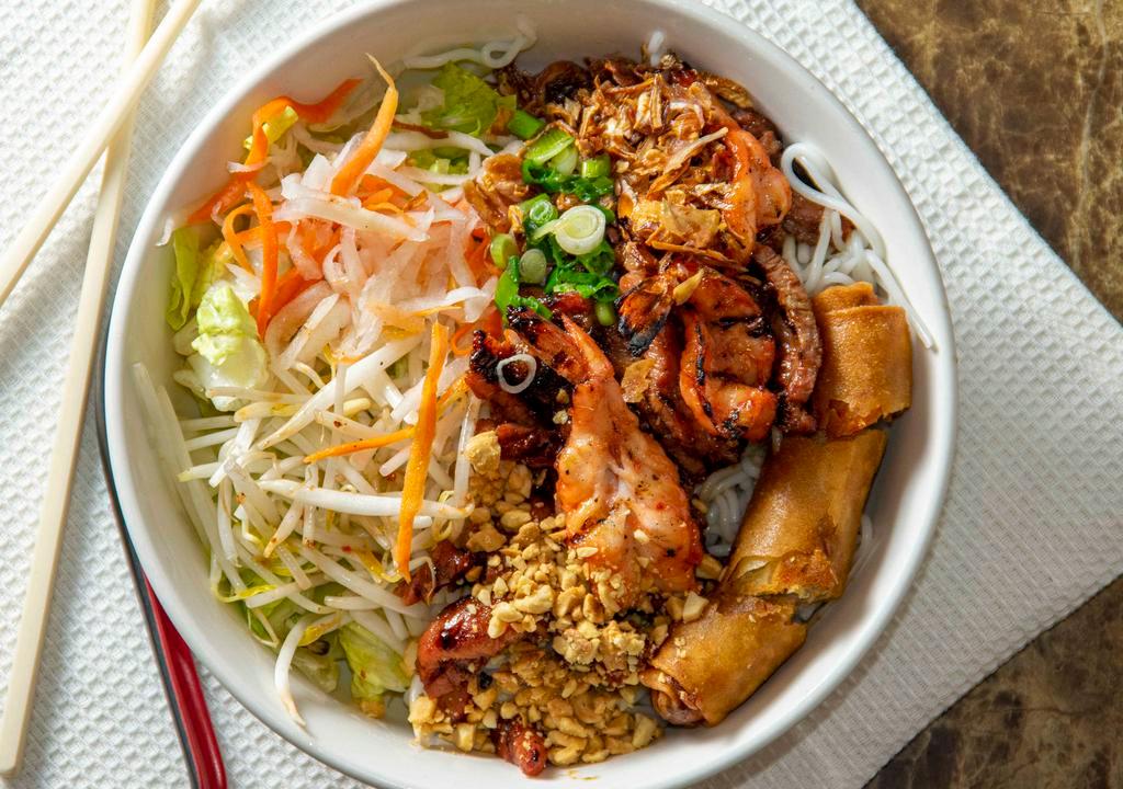 Rice Noodle Combo Bowl · Choose between grilled pork or grilled chicken with grilled shrimp and egg roll.