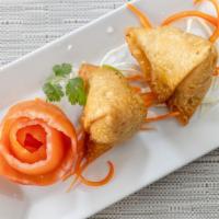 Veg Samosa · Savory pastry fried in ghee or oil, containing spiced vegetables.