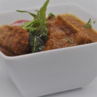 Hyderabad Goat Masala · Succulent pieces of goat cooked to perfection in a blend of masala pieces.