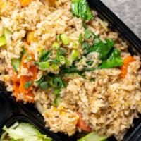 Thai Fried Rice · Thai fried rice with egg tomato, carrot yellow and green onion.