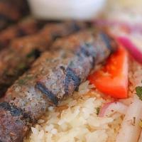Kafta · Ground sirloin, onions, parsley, spices, grilled with rice.