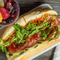 Bánh Mì Sandwich · Toasted French baguette serve with choices of lettuce : pickle carrots and daikon or pickle ...