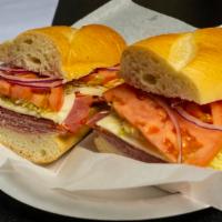 Italian Sandwich · Genoa salami, mortadella and provolone cheese. Garnished with lettuce, tomato, onion, mustar...