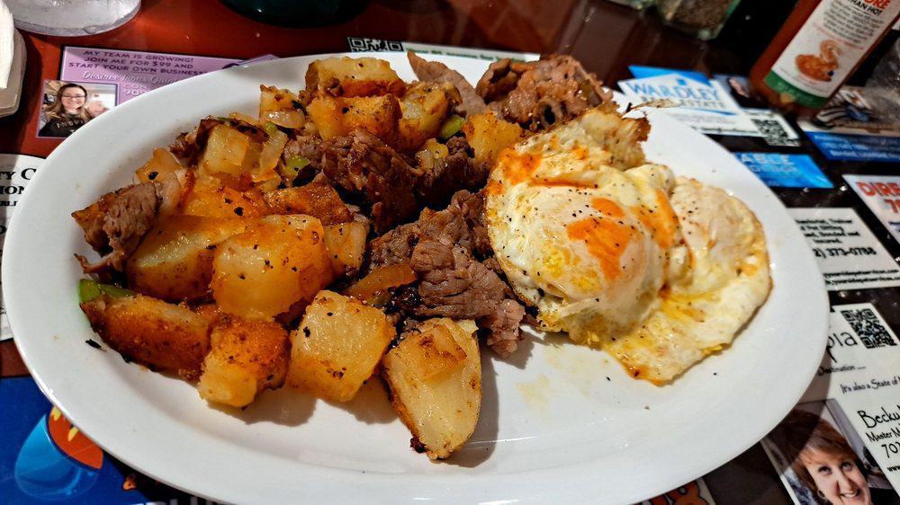 Corned Beef Hash & Eggs · Consuming raw or undercooked meat, poultry, seafood, or eggs may increase your risk of foodborne illness.
