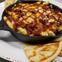 Tony'S Bbq Mac · An amazing blend of caramelized onions, BBQ sauce, bacon, mozzarella and Parmesan cheeses, t...