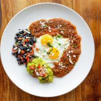 Huevos Rancheros · Two local handmade tortillas, two eggs any way, pueblo- style back beans, maple syrup, date ...