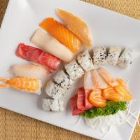 Sushi & Sashimi · Six pieces of sushi, California roll, and assorted sliced raw fish.