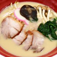 Tonkotsu Ramen Noodles · Steamed pork, vegetables, and pork broth with noodles.