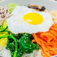 Bibimbap · Vegetables and beef or tofu with Korean style hot pepper paste.