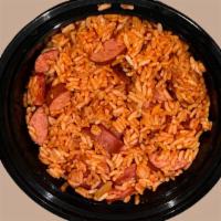 Charleston Red Rice · A Carolina Low Country tradition of cooked rice with tomato sauce, beef sausage, onions & gr...
