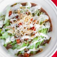 Burrito Bowl · Refried Pinto Beans, Mexican Rice, Lettuce, Pico de Gallo, Cheese, Crema, Protein of Choice