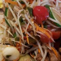Som Tum · Shredded green papaya and carrots with tomatoes, garlic, chili in fish sauce-lime juice. Top...
