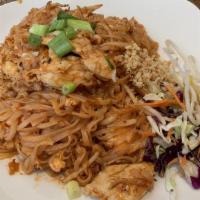 Pad Thai · Rice noodles stir-fried with egg, bean sprouts, green onion and topped with ground peanut.