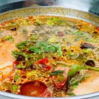 Tom Yum Koong Nam Kon 16 Oz · Choice of Jumbo Shrimp or Tofu in Thai Herbal Based Broth; Lemongrass, MaGood Leaves, Galang...