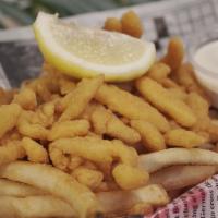 Clams & Chips · Fried clam strips with french fries and tartar sauce.