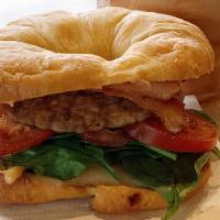 Breakfast Croissant & Seasonal Salad · Egg, sausage, smoked Gouda, tomatoes, spinach and house spicy aioli.