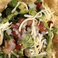 Veggie Taco Salad · Large Deep Fried Tortilla Shell Filled With Romaine Lettuce, Mexican Rice, Beans, Grilled Ve...