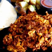 Ranchero Skillet · Chorizo & scrambled eggs over home fries with a side of pico, avocado, sour cream and two co...