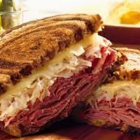 Reuben Pastrami · Pastrami, lettuce, tomato, red onion, sprouts, Swiss cheese & honey mustard dressing on ciab...