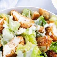 Chicken Caesar · Romaine lettuce, croutons, Parmesan cheese, chicken breast & Caesar dressing