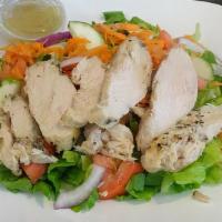 Chicken House Salad · Fresh garden salad accompanied by mesquite-grilled chicken slices.