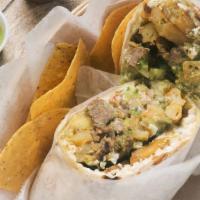 Chicken Burro · Our burros are made with a traditional flour tortilla filled with fresh cabbage, grilled chi...